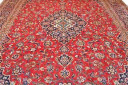 Central medallion detail of 2000s Kashan rug from Iran / Persia