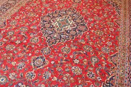Close-up detail of 2000s Kashan rug from Iran / Persia showing Wool weave