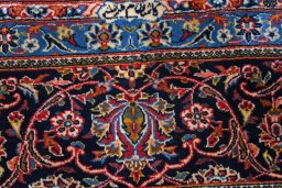 Surface texture of 2000s Kashan rug with natural Wool and intricate pattern