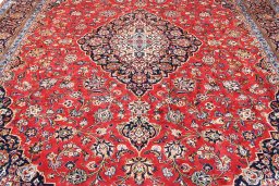 Central medallion detail of 2000s Kashan rug from Iran / Persia
