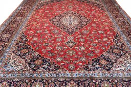 Close-up detail of 2000s Kashan rug from Iran / Persia showing Wool weave