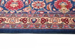 Backside of handmade 1930s Kashan rug showing knot structure and weave density