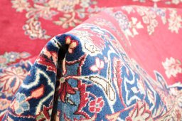 Close-up detail of 1930s Kashan rug from Iran / Persia showing Wool weave