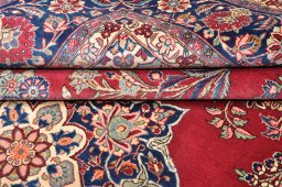 Full view of 1930s Kashan rug from Iran / Persia, 374 × 263 cm in Red tones