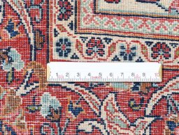 Corner detail of 1930s Kashan rug showing border pattern and Wool pile