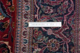 Surface texture of 1930s Kashan rug with natural Cork and intricate pattern