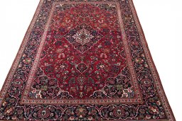 Surface texture of 1930s Kashan rug with natural Cork and intricate pattern
