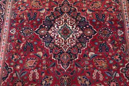 Backside of handmade 1930s Kashan rug showing knot structure and weave density