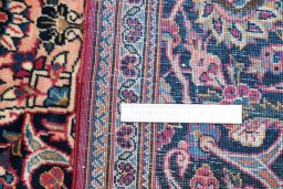 Surface texture of 1930s Kashan rug with natural Wool and intricate pattern