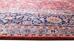 Corner detail of 1970s Kashan rug showing border pattern and Wool pile
