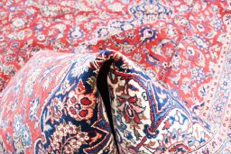 Surface texture of 1970s Kashan rug with natural Wool and intricate pattern