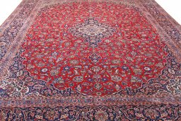 Surface texture of 1970s Kashan rug with natural Wool and intricate pattern