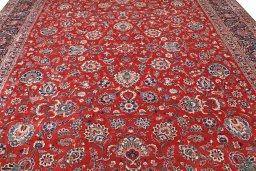 Backside of handmade 1930s Kashan rug showing knot structure and weave density