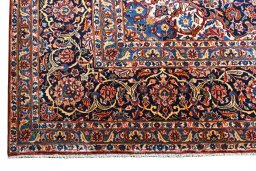 Central medallion detail of 2000s Kashan rug from Iran / Persia