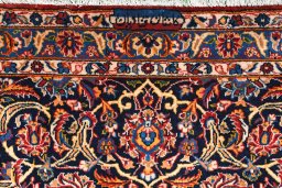 Close-up detail of 2000s Kashan rug from Iran / Persia showing Wool weave