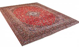 Corner detail of 2000s Kashan rug showing border pattern and Wool pile
