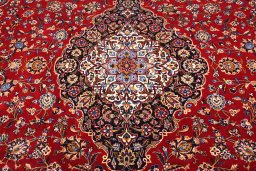 Close-up detail of 2000s Kashan rug from Iran / Persia showing Wool weave