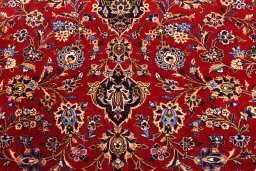 Surface texture of 2000s Kashan rug with natural Wool and intricate pattern