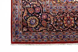 Close-up detail of 2000s Kashan rug from Iran / Persia showing Wool weave