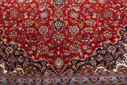 Central medallion detail of 2000s Kashan rug from Iran / Persia
