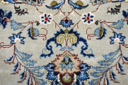 Close-up detail of 2000s Kashan rug from Iran / Persia showing Wool weave
