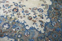 Close-up detail of 2000s Kashan rug from Iran / Persia showing Wool weave