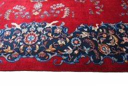 Central medallion detail of 2000s Kashan rug from Iran / Persia