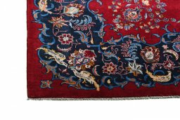 Close-up detail of 2000s Kashan rug from Iran / Persia showing Wool weave