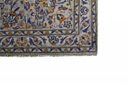 Close-up detail of 2000s Kashan rug from Iran / Persia showing Wool weave