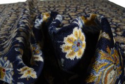Surface texture of 2000s Kashan rug with natural Wool and intricate pattern