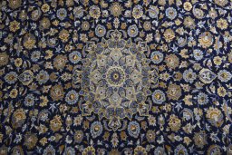 Central medallion detail of 2000s Kashan rug from Iran / Persia