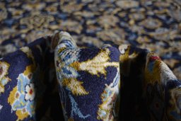 Surface texture of 2000s Kashan rug with natural Wool and intricate pattern