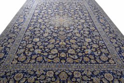 Surface texture of 2000s Kashan rug with natural Wool and intricate pattern