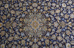 Central medallion detail of 2000s Kashan rug from Iran / Persia