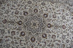 Central medallion detail of 2000s Kashan rug from Iran / Persia
