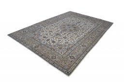 Corner detail of 2000s Kashan rug showing border pattern and Wool pile