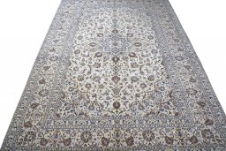 Surface texture of 2000s Kashan rug with natural Wool and intricate pattern