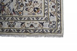 Central medallion detail of 2000s Kashan rug from Iran / Persia