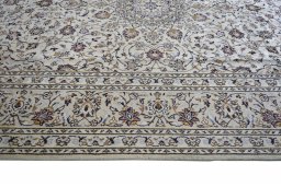 Close-up detail of 2000s Kashan rug from Iran / Persia showing Wool weave