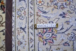 Full view of 2000s Kashan rug from Iran / Persia, 365 × 245 cm in Beige tones
