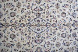 Central medallion detail of 2000s Kashan rug from Iran / Persia
