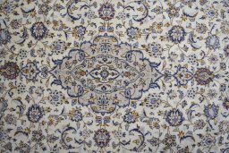 Central medallion detail of 2000s Kashan rug from Iran / Persia