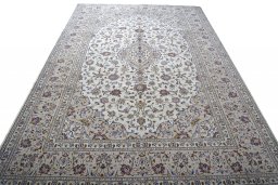 Surface texture of 2000s Kashan rug with natural Wool and intricate pattern