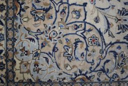 Central medallion detail of 2000s Kashan rug from Iran / Persia