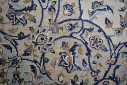 Close-up detail of 2000s Kashan rug from Iran / Persia showing Wool weave