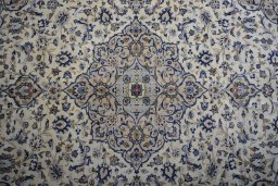 Central medallion detail of 2000s Kashan rug from Iran / Persia