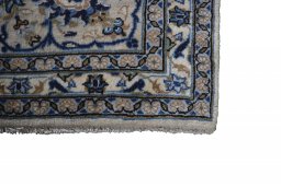 Close-up detail of 2000s Kashan rug from Iran / Persia showing Wool weave
