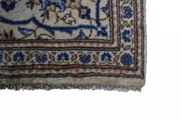 Close-up detail of 2000s Kashan rug from Iran / Persia showing Wool weave