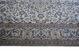Full view of 2000s Kashan rug from Iran / Persia, 308 × 194 cm in Beige tones