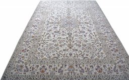 Surface texture of 2000s Kashan rug with natural Wool and intricate pattern